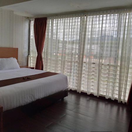 Hotel Belangi Syariah Taakengon Mitra Reddoorz Takengon Buitenkant foto